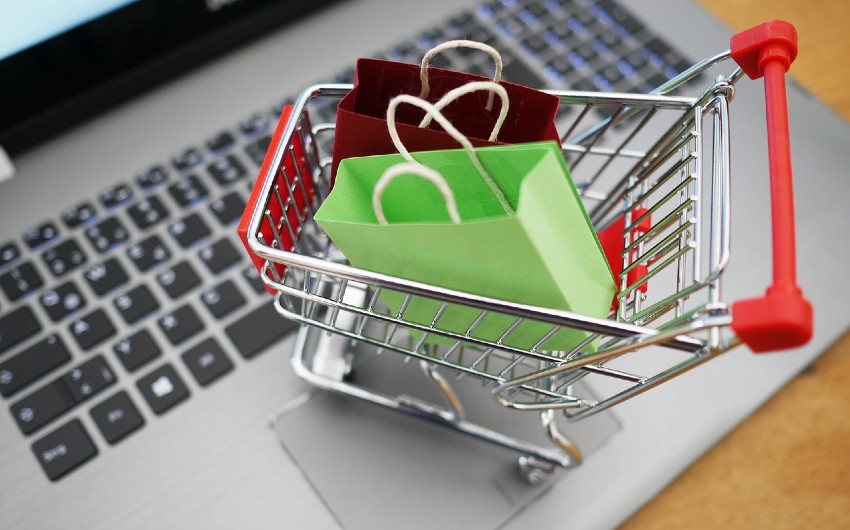 A Miniature Version of Shopping Cart on Laptop Keyboard