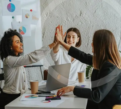 Women giving high five