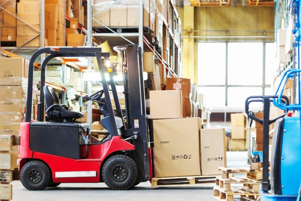 A bustling warehouse floor with shelves stocked high and workers managing inventory.