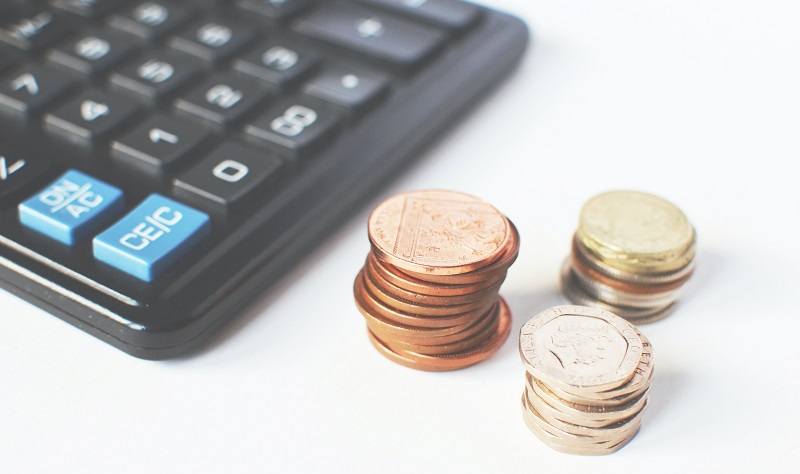 calculator and coins