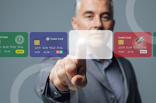 man with debit and credit cards