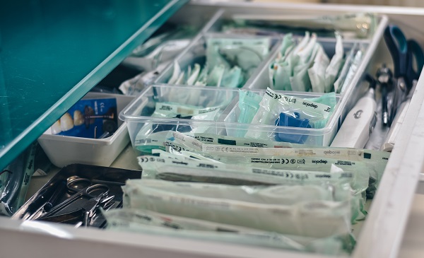 drawer full of dental supplies