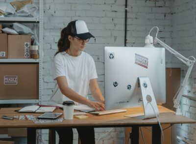 woman-typing-at-desktop-computer woman typing at computer