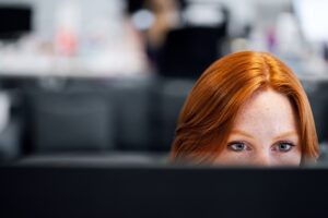 woman focused on her computer
