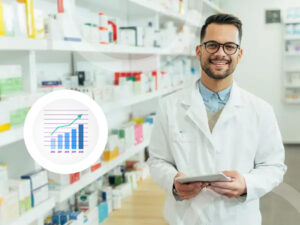 pharmacist holding tablet