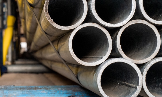 pallet of plastic pipes