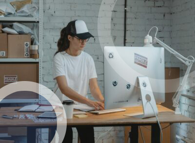women typing at desktop